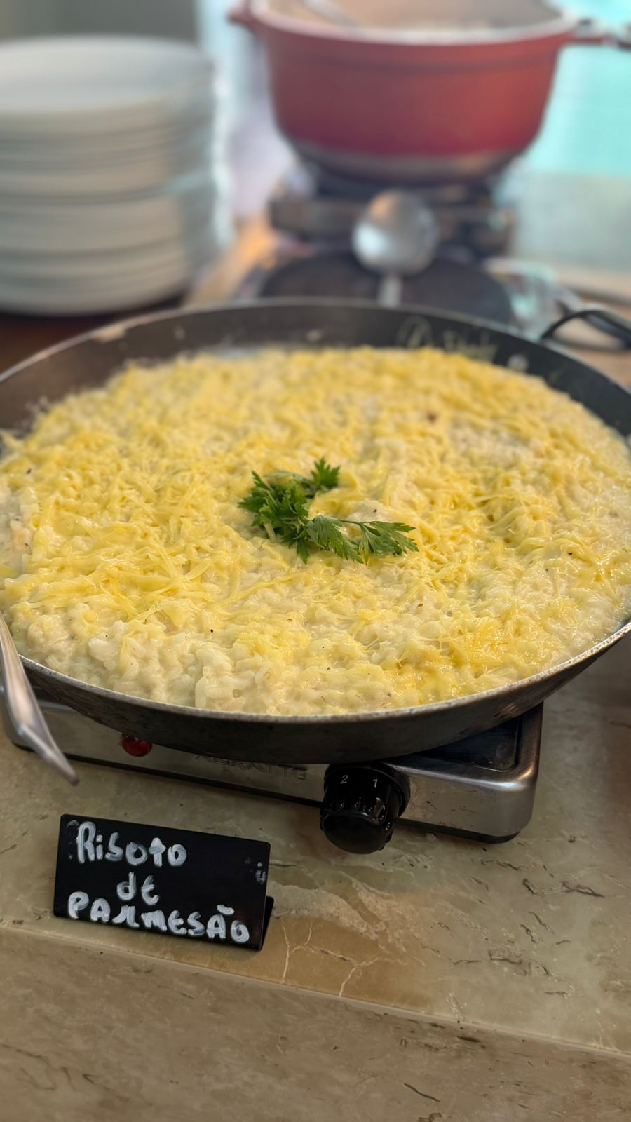 Risoto cremoso servido na Aurora Cozinha